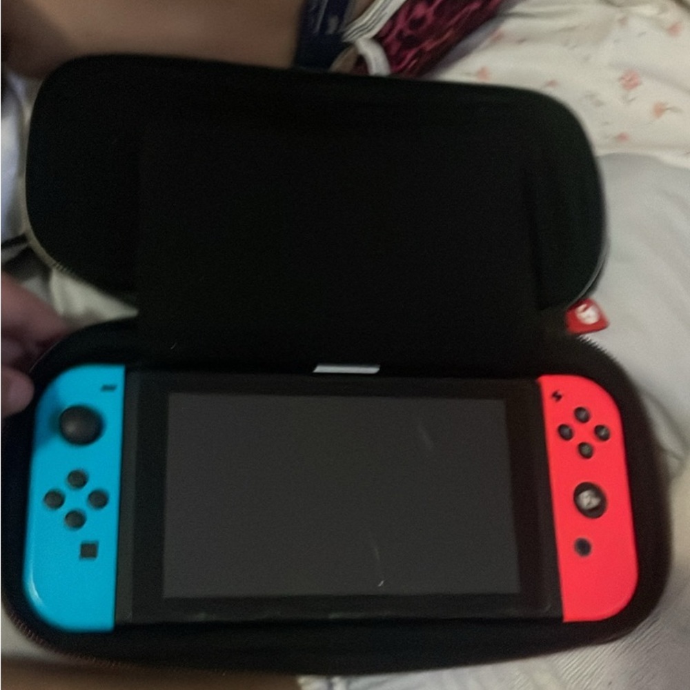 Nintendo Handheld Console - Vibrant Blue and Red